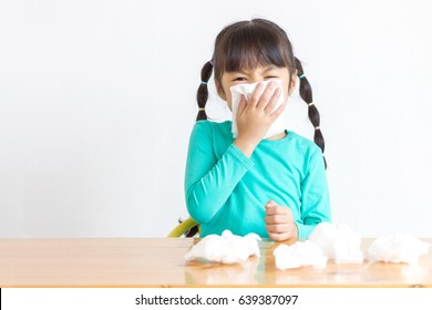 Asian Kid With The Tissue, She Got A Cold.