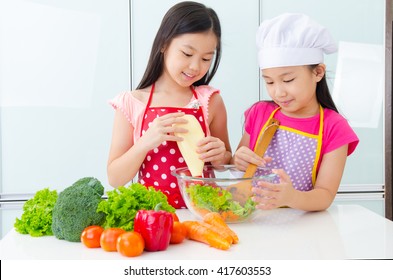 Asian Kids Enjoyed Cooking