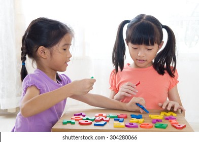 Asian Kids Playing Alphabet Letters