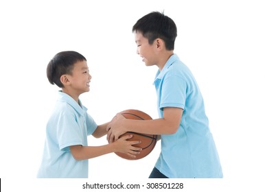 Asian Kids Playing Basketball