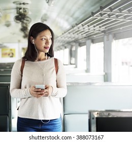 Asian Lady Traveling Commute Train Concept