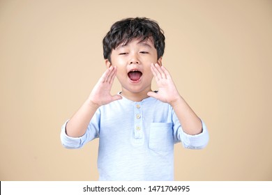 Asian Little Boy Shout With Happy Wow Surprised Face