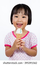 Asian Little Chinese Girl Eating Ice Cream Isolated On White Background