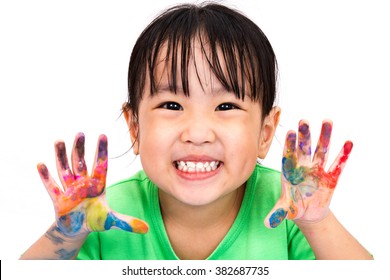 Asian Little Chinese Girl Playing And Painting Isolated On White Background