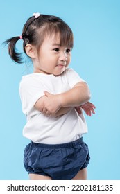 Asian little girl arm cross - Shutterstock ID 2202181135