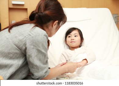 asian little girl in hospital - Powered by Shutterstock