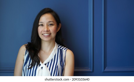 Asian Long Hair Mature Adult Working Woman Blue Background Smiling Happiness