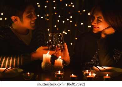 Asian Lovers Couple Having Romantic Moment Celebrating Wedding Anniversary Together At Dinner. Concept Of Lovers Couple Relationship On Wedding Anniversary