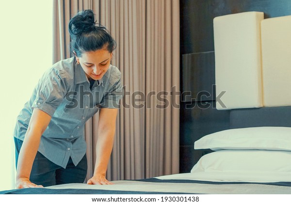 Asian Maid Making Bed Hotel Room Stock Photo Edit Now 1930301438