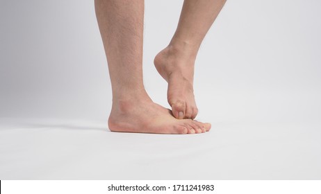 Asian Male Barefoot Is Isolated On White Background.