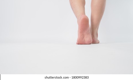 Asian Male Barefoot Is Isolated On White Background.