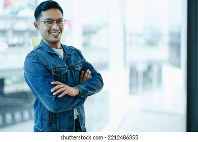 Asian Male Business Owner Smiling In Front, Showing His Success In Business Investment.