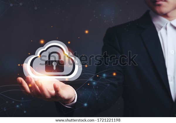 Asian male\
businessmen with Security lock cyber is a key safe device\
protection upload backup data on the cloud keep for privacy\
database. Concept of preventing data\
theft	