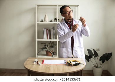 Asian Male Doctor Preparing Syringe Vaccine And Vial For Injection To Illness Patient  - Powered by Shutterstock