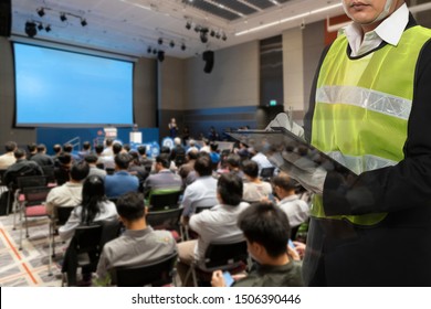 Asian Male Occupational Health And Safety Officer In Seminar Room