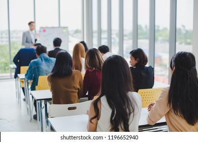 Asian male speaker is speaking at seminars and workshops to the people in the meeting. - Powered by Shutterstock