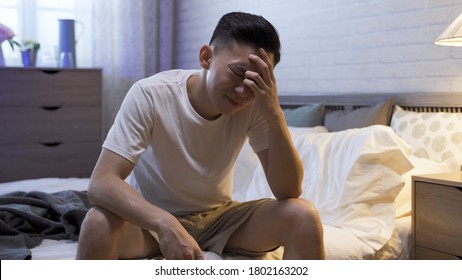 Asian Male Staying Awake Until Daybreak Is Painful.