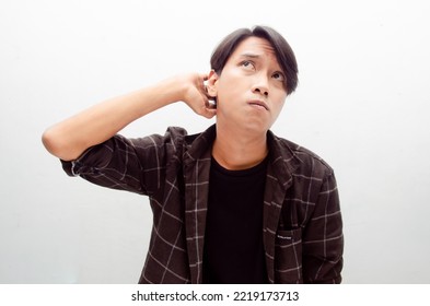 Asian Male Student Or Millenial Worker Questioning Why With Upset, Shock And Confuse Expression Isolated Over White Background. 