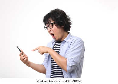 The Asian Man Angry At Mobile Phone