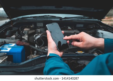 Asian Man Anxiety About The Car Breaking Down  While Traveling.