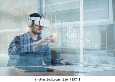 Asian man Architect or Engineer wearing VR headset for working design 3D architectural building model with BIM technology and virtual reality technology. Concept futuristic design. - Powered by Shutterstock