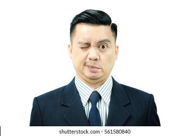 Asian Man With Bell's Palsy Close Eyes With Only Half Face