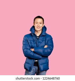 Asian Man In Blue Down-padded Coat, Isolated On Trendy Gradient Background