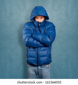 Asian Man In Blue Down-padded Coat