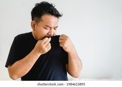 Asian Man Body With Sweat On Black T Shirt Workout Fit From Home.bad Smell Breathing On Armpit With Black Shirt.indian Man Smelly.hyperhidrosis, Deodorant, Medical Health.Men Skin Body Care.