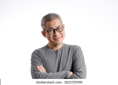 The Asian Man With Buzz Hair Standing On The White Background.