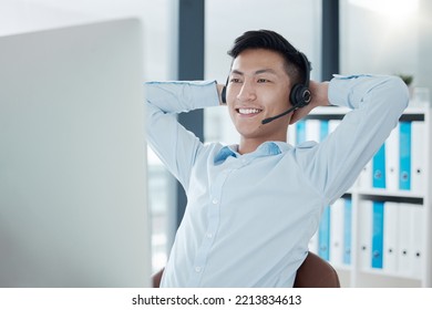 Asian Man In Call Center Office Stretching, Relax In Easy Working For Customer Support Service Company In Seoul..Telemarketing Agent In Corporate Consulting, Receptionist Call And Employee Wellness