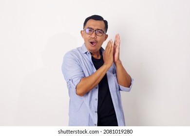 Asian Man Clapping And Applauding Happy And Joyful, Smiling Proud Hands Together