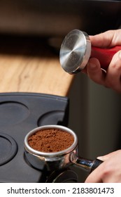 Asian Man Coffee Shop Part Time Employee Brew Hot Coffee In Coffee Machine. Male Barista Hand Making Espresso From Ground Coffee Maker At Modern Cafe. Small Business And Part Time Job Working Concept.