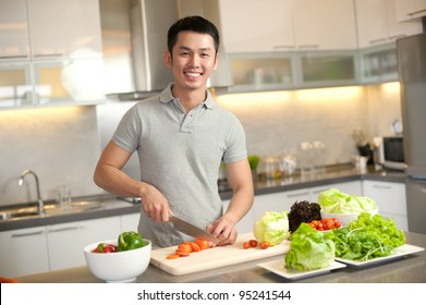 Asian Man Cooking