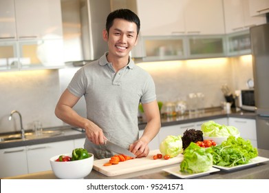 Asian Man Cooking