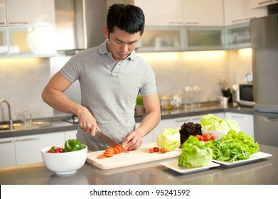 Asian Man Cooking