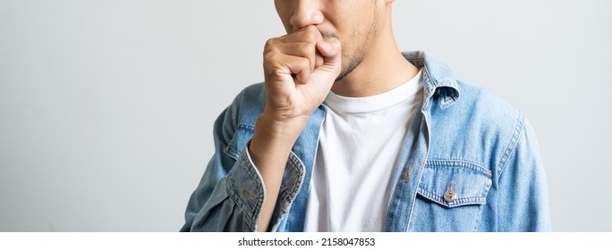 Asian Man Coughing Isolated On Background.