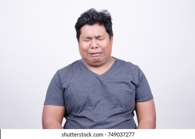 Asian man with crying face