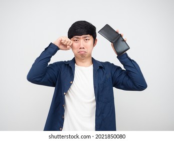 Asian Man Crying And Holding Empty Wallet In Hand White Background Portrait