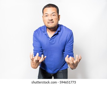 Asian Man Dark Skin Get Angry, Edgy And Gesturing Temper In Studio Shot White Background