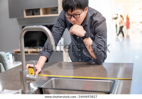 Asian Man Designer Using Tape Measure Stock Photo Edit Now