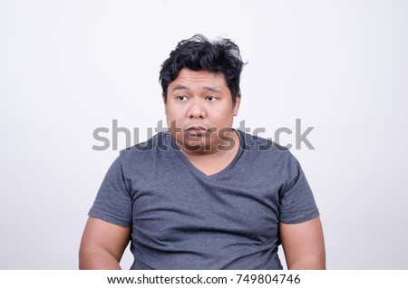 asian man disgusted face stock photo edit now 749804746 shutterstock