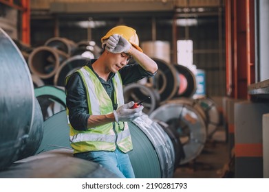 Asian Man Engineer  Working Hard In Factory , Worker Employee  Hard Hat Safety Control Machine Factory 