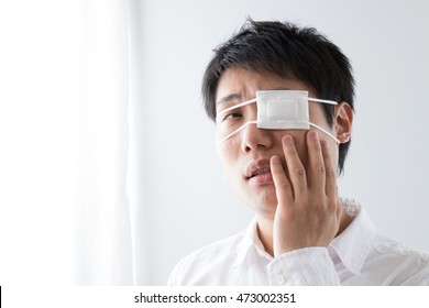 Asian Man With The Eye Patch