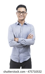 Asian Man In Glasses Isolated Portrait. He Is Standing With Arms Folded Against White Background. Concept Of Successful Businessman. 