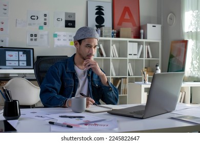 Asian man Graphic designer working in office. Artist Creative Designer Illustrator Graphic Skill Concept. - Powered by Shutterstock