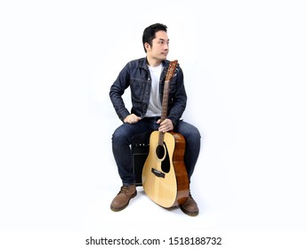 Asian Man With Guitar Musician Sitting