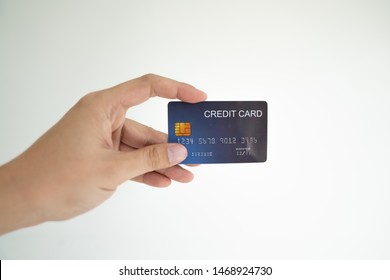 Asian Man Hand Holding A Credit Card With White Background.