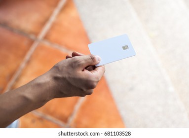 Asian Man Hand Holding Credit Card