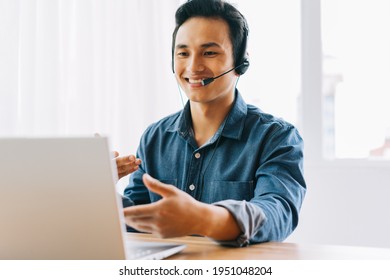 The Asian man is having an online discussion with his subordinates
 - Powered by Shutterstock